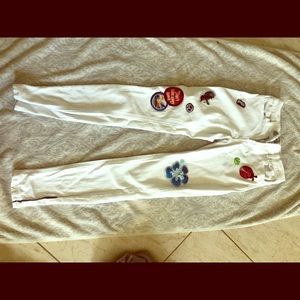 White denim patch jeans
